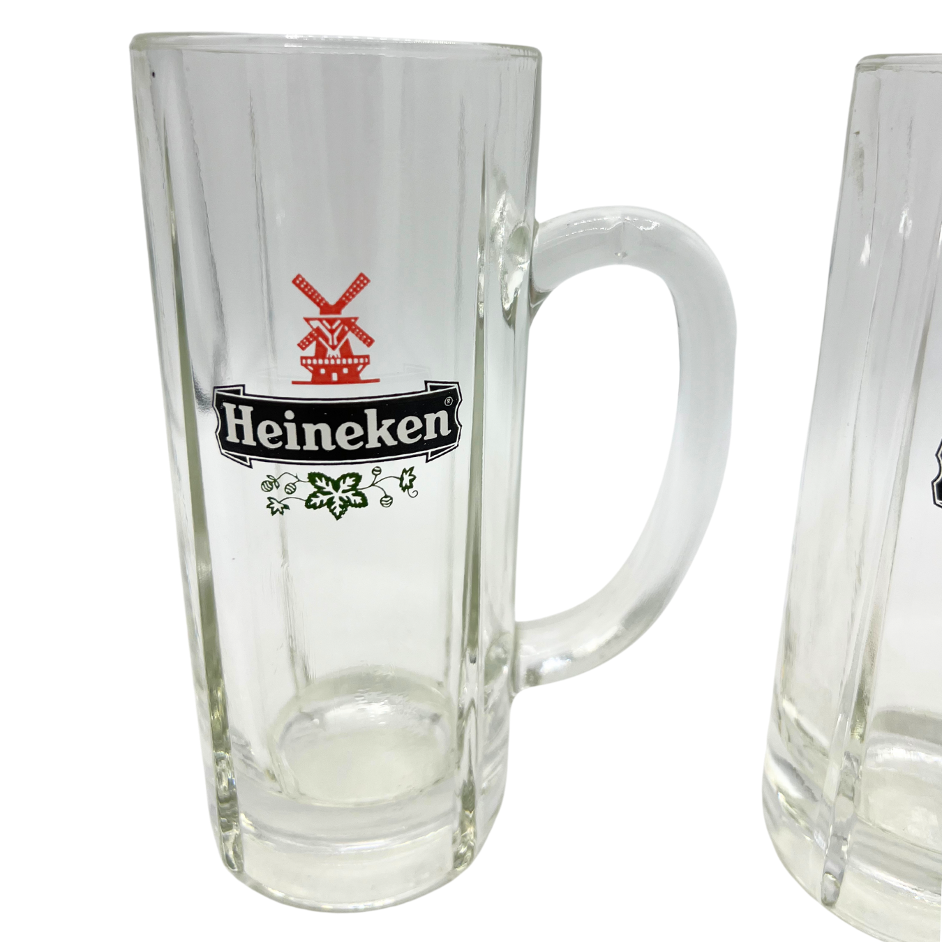 pair of vintage Heineken mugs