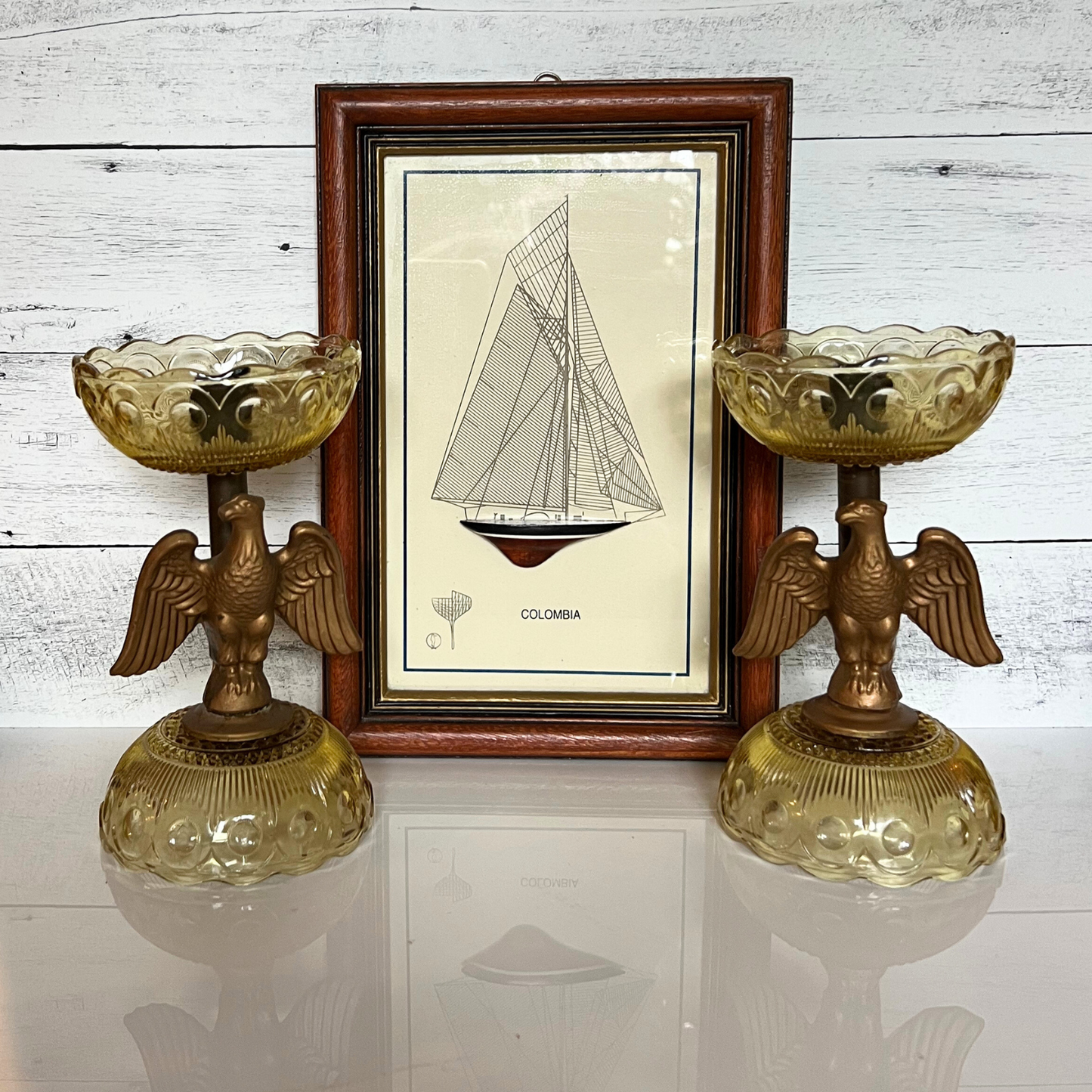 pair of mid-century amber glass eagle candlesticks