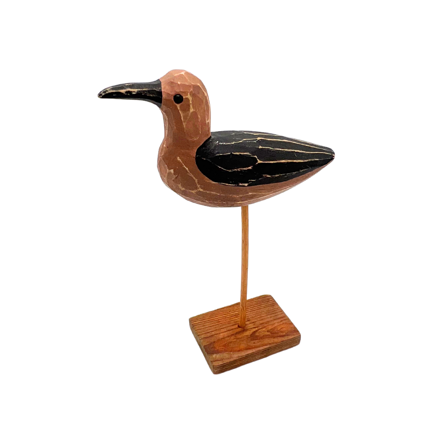carved wooden shorebird