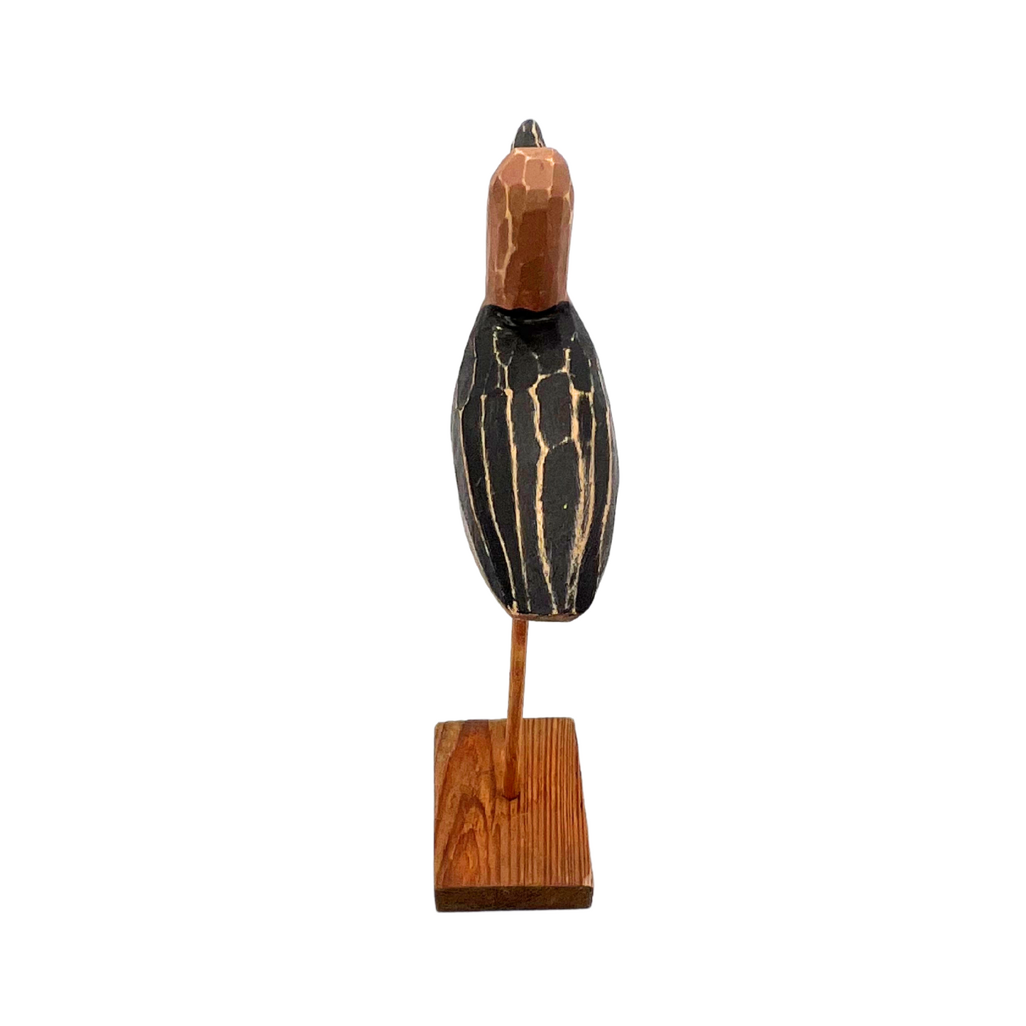 carved wooden shorebird