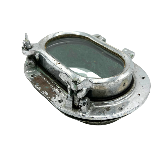 salvaged chrome covered brass oval porthole