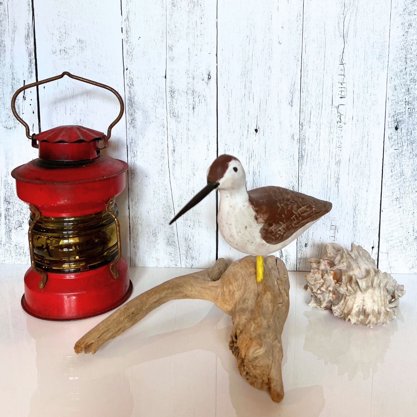 vintage shorebird on driftwood