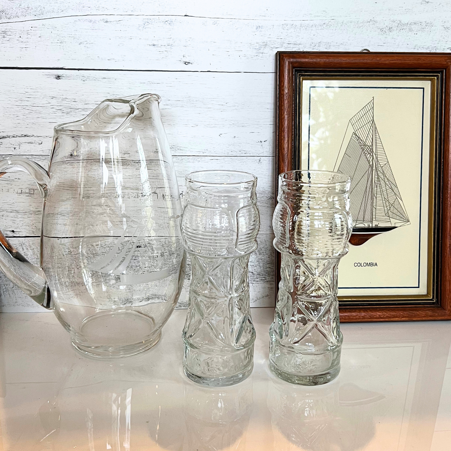pair of vintage Red Lobster lighthouse glasses
