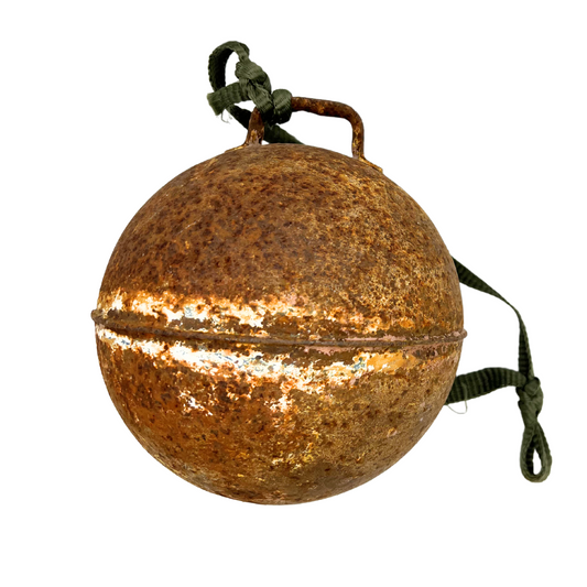 weathered metal fishing buoy