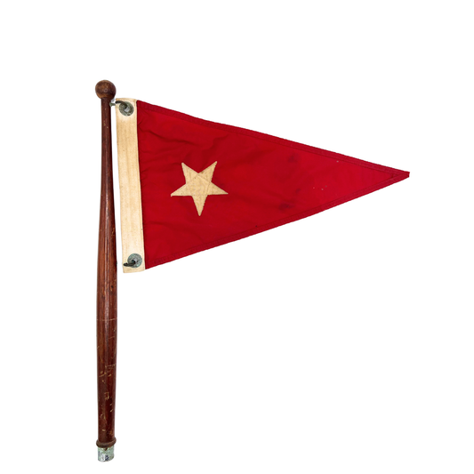 vintage star burgee on teak pole