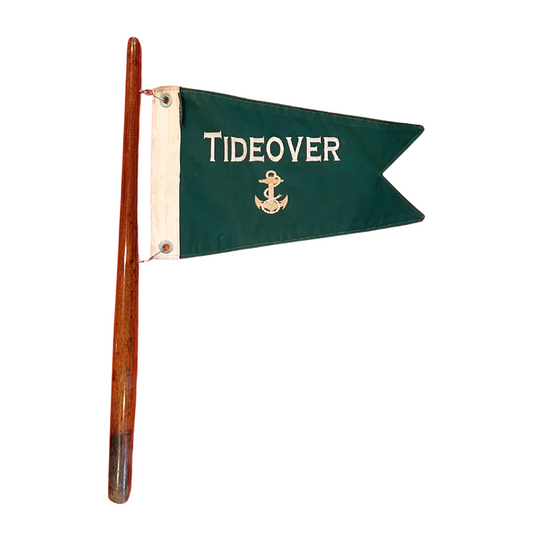 salvaged yacht flag on teak pole