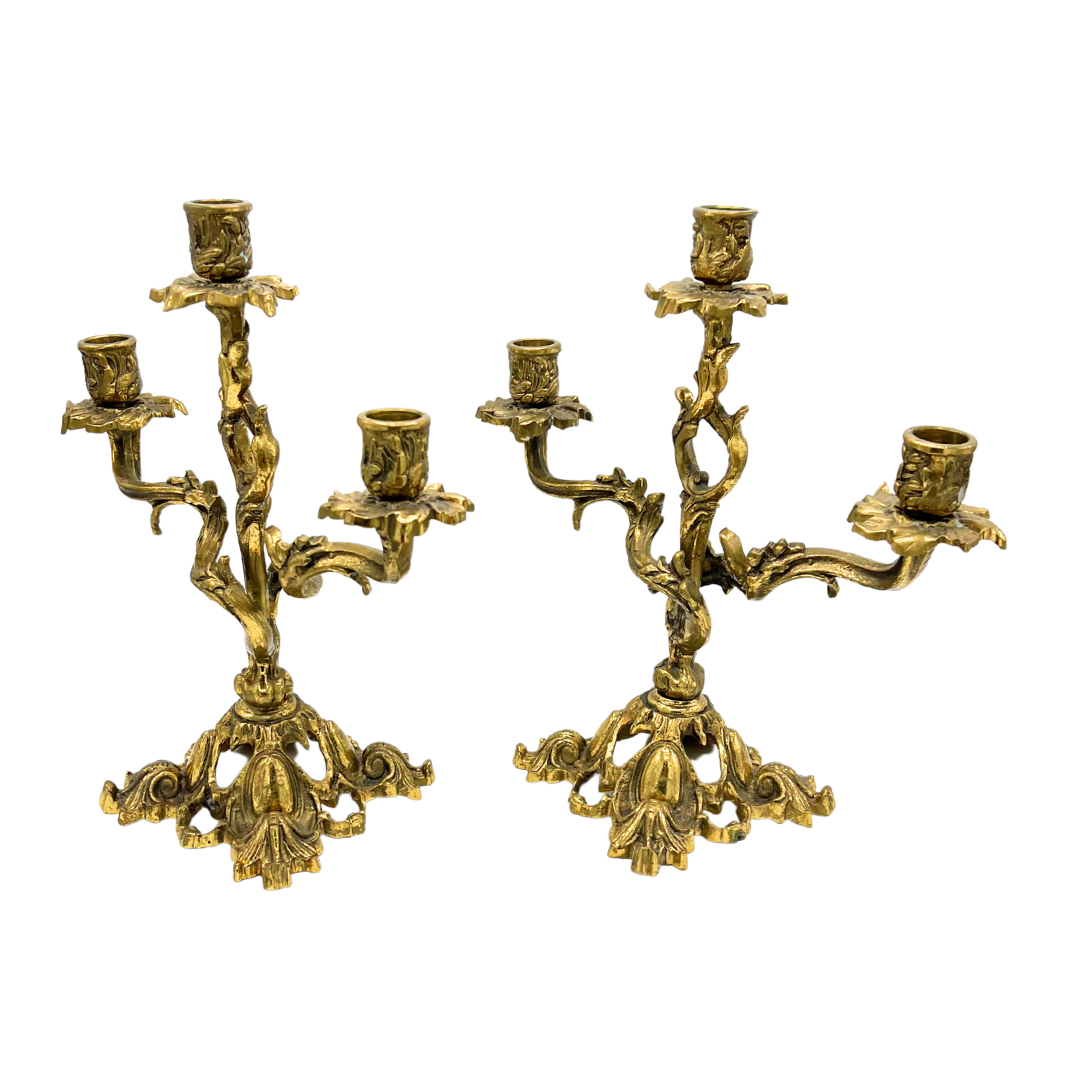 pair of ornate vintage brass candlesticks