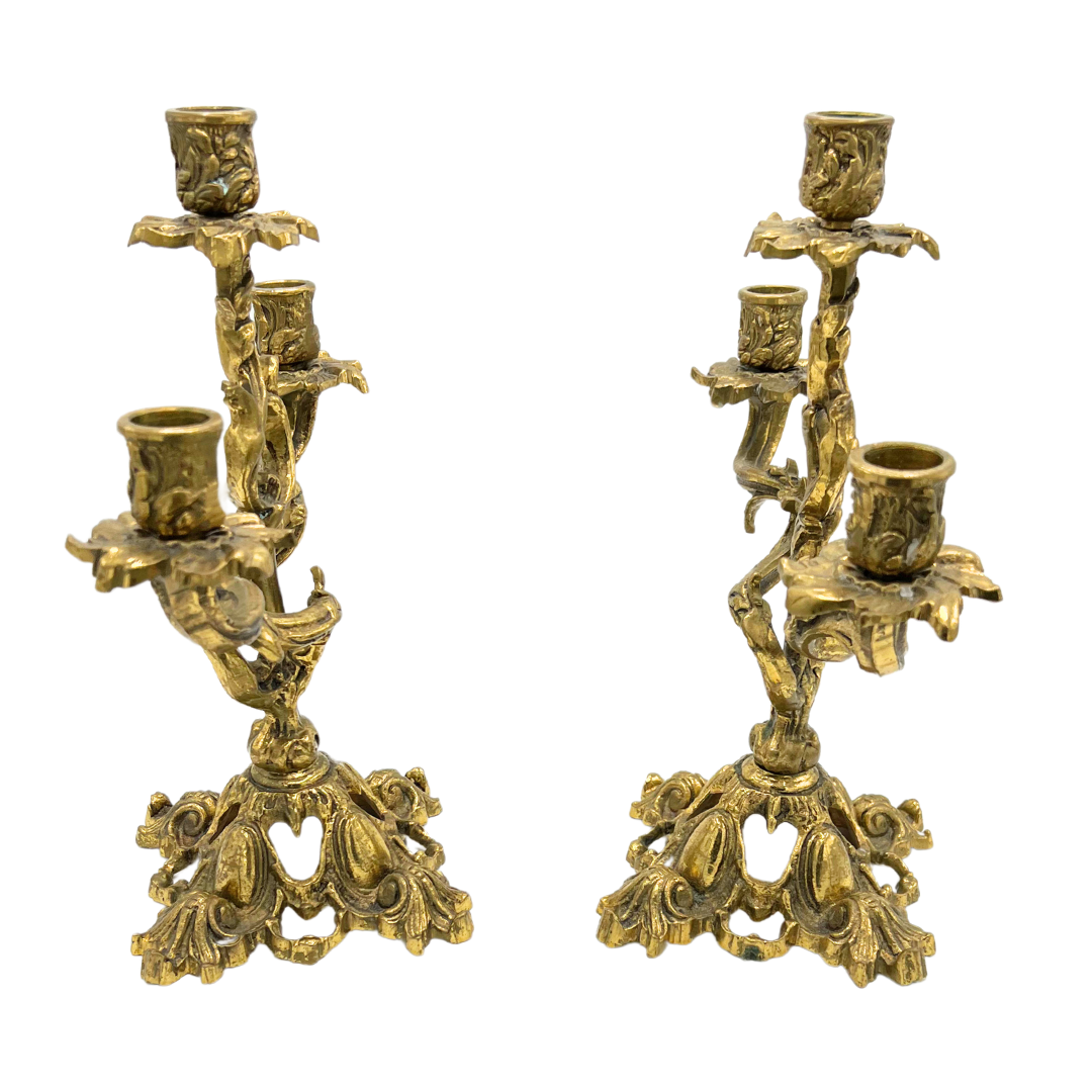 pair of ornate vintage brass candlesticks