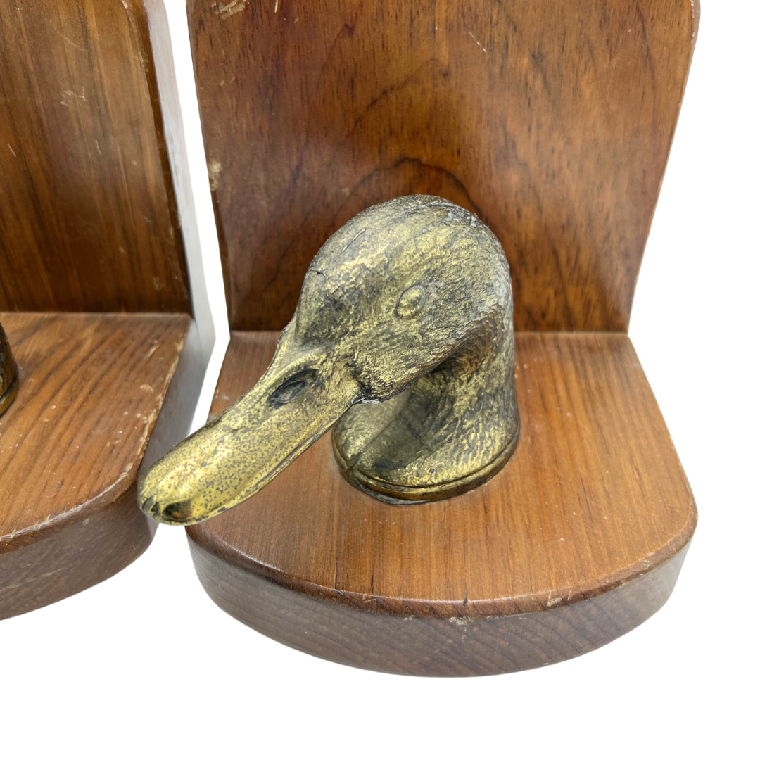 pair of vintage wood and brass duck bookends