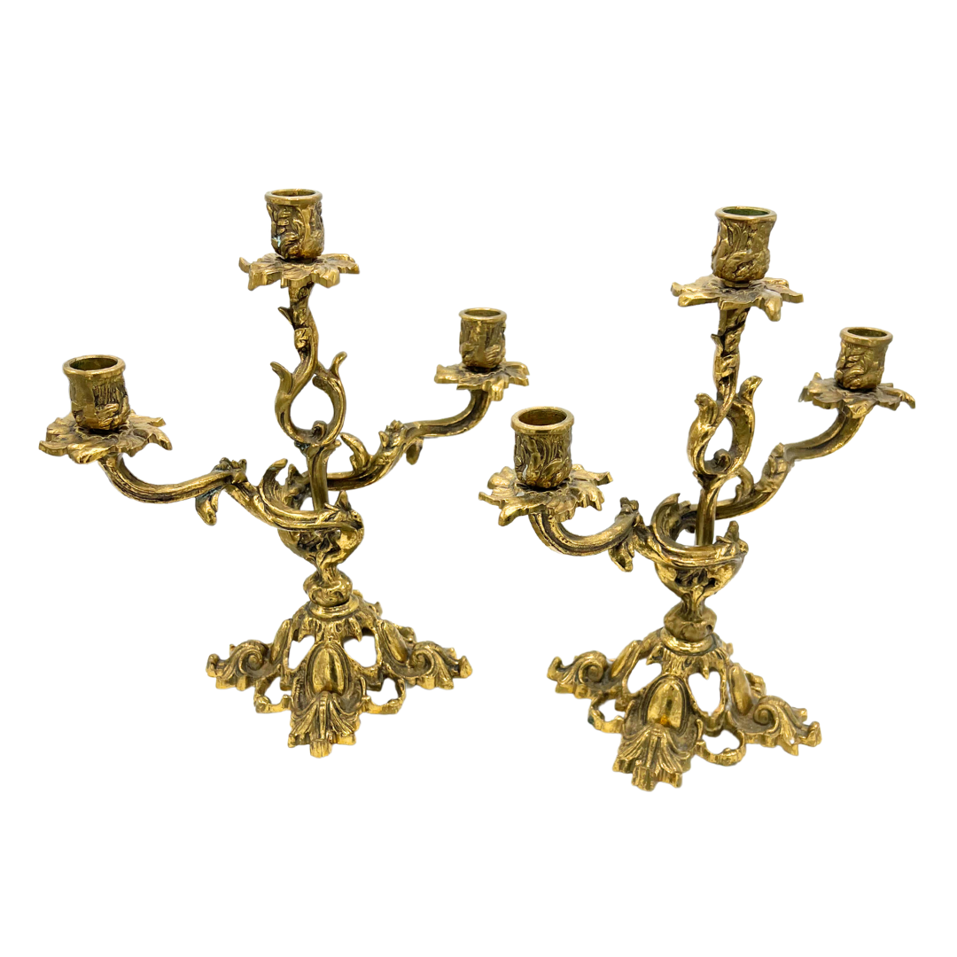 pair of ornate vintage brass candlesticks