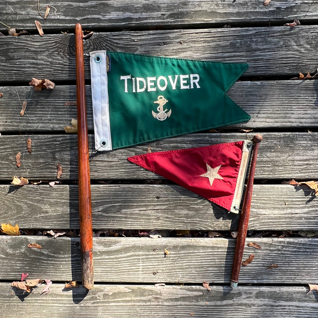 salvaged yacht flag on teak pole